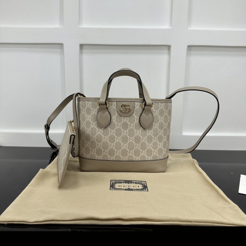G*u*i shopping bags